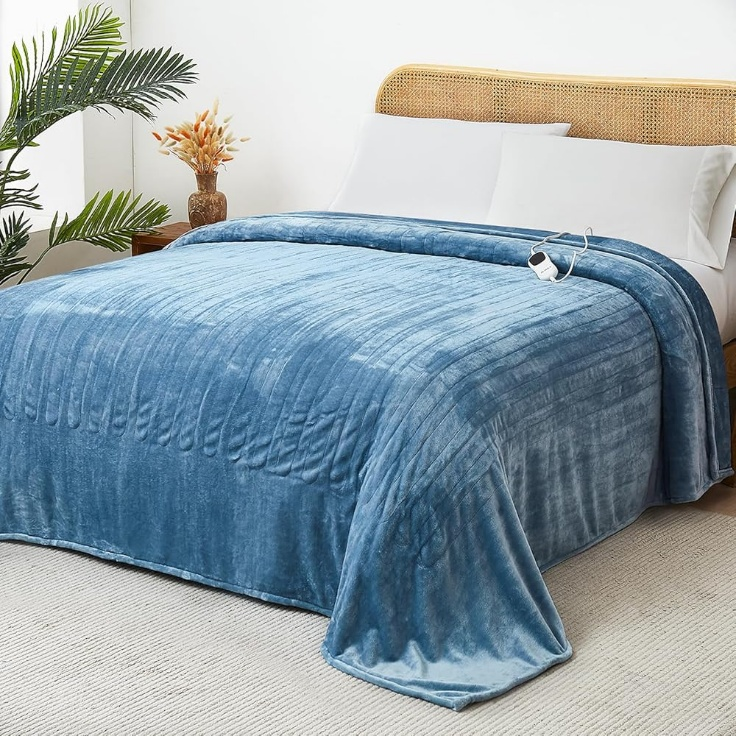 Blue JKMAX heated blanket displayed on a bed
